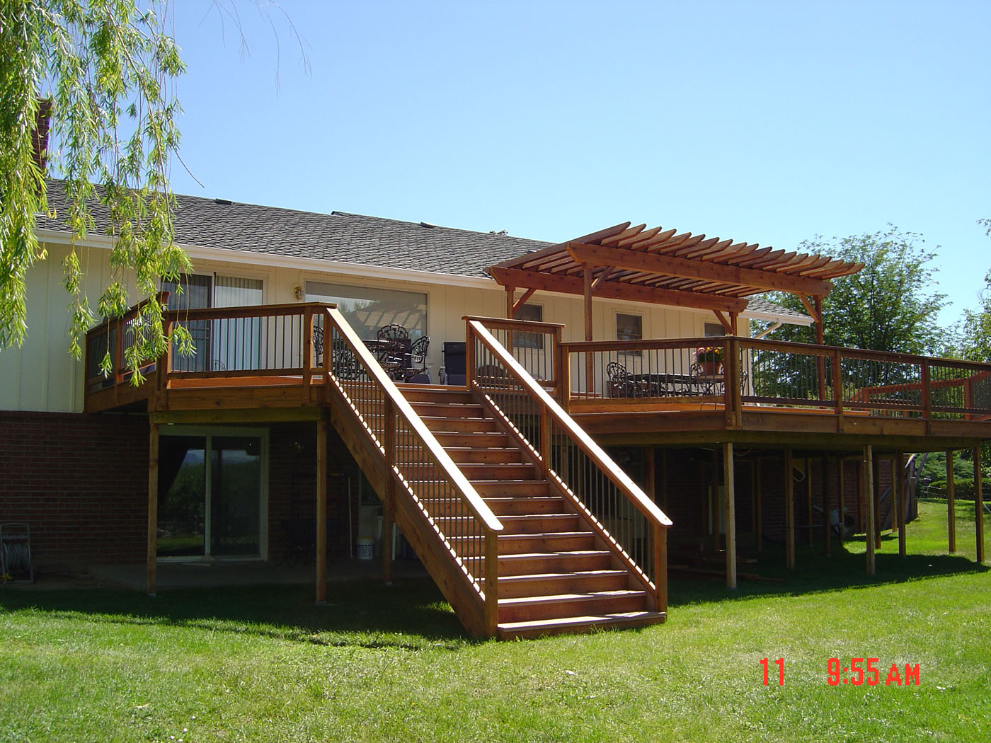 second story wood deck with stairs