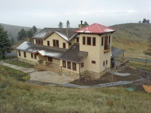 a custom built Colorado foothills home, front view