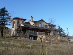a custom built Colorado foothills home, front view