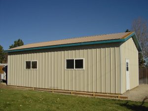 This is the side view of a custom pole barn, showing the windows.