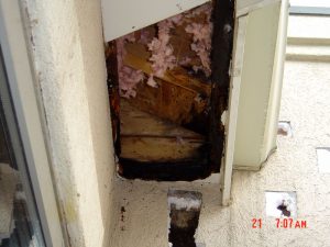 This is a close up of water damage on the exterior of a house.