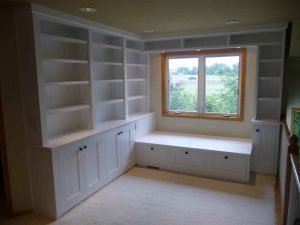 Here is a closet remodel with built-in shelves and cupboards.