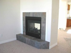 This is a two-sided fireplace in a custom home.