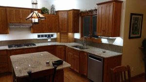 This is a complete kitchen remodel with wood cabinets.