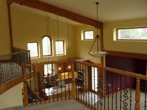 This shows the downstairs living area from the upstairs loft in a custom home remodel.