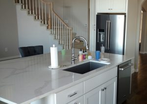 This shows a kitchen after rearranging and remodeling